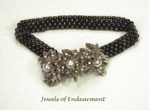 Hand beaded  Japanese and Czech seed beads, with pearls  and Czech glass bead accents form a garden.