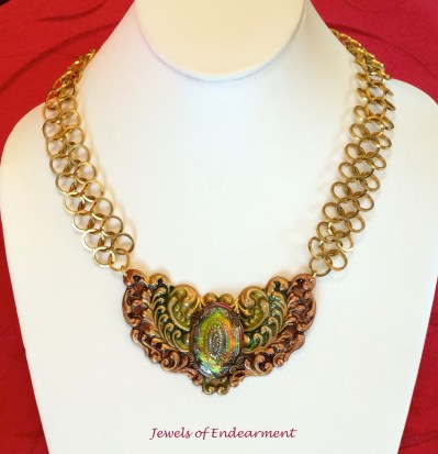 Radiant Emerald and Wine Necklace The rich palette of this glowing Czech glass deserved equally sumptuous hues to complement it. The chain is handmade with squared rings.